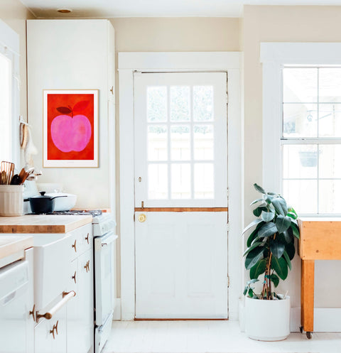 Pink apple kitchen prints, Apple illustration wall art hanging in white and bright cosy kitchen interior