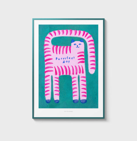 Pink cat wall art print featuring a whimsical illustration of a pink cat with stripes and long tail and green background, painted with gouache and with hand drawn quote saying "Purrrfect day", meaning a perfect day.