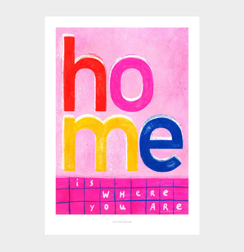 Bold and colorful Typography poster featuring an illustrated phrase saying "home is where your are" with vibrant pink, red and yellow color palette.