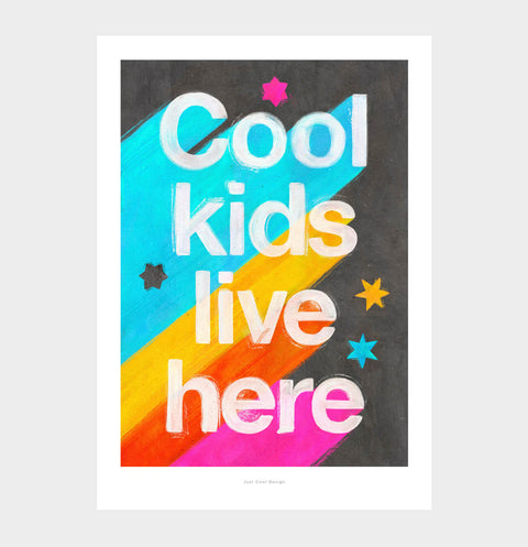 The perfect print for modern nurseries. Artful and colorful quote wall art print with the quote "cool kids live here". Cool poster for kids with bold hand drawn typography and vibrant colors.