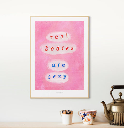 Women empowerment posters with pink and blue hand painted quote "real bodies are sexy". Feminist poster with hand drawn typography.